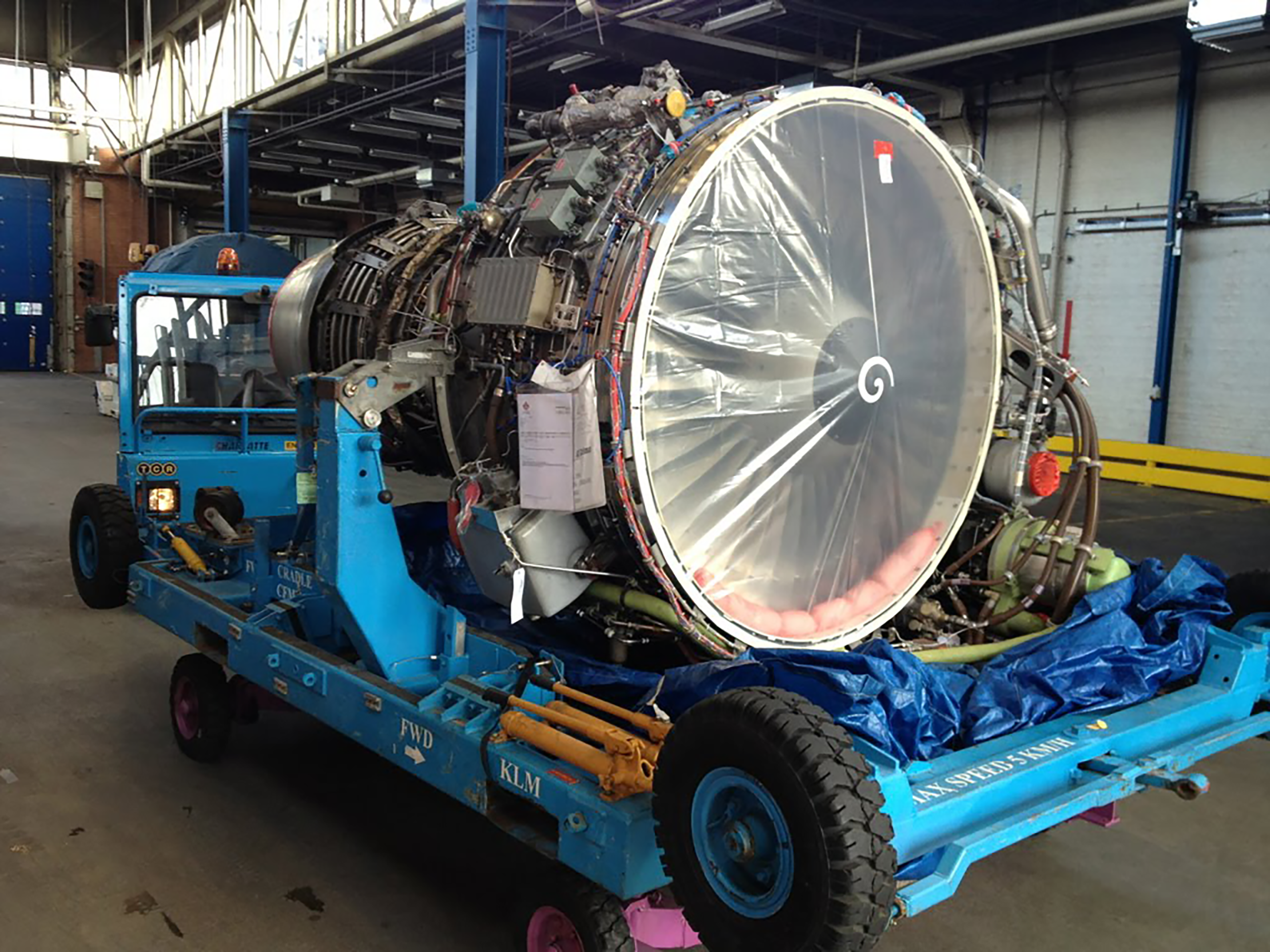 AeroCanada jet engine on nacelle in maintenance hangar